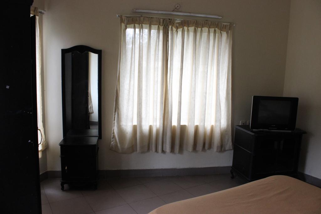 Albarad Hotel Munnar Rum bild